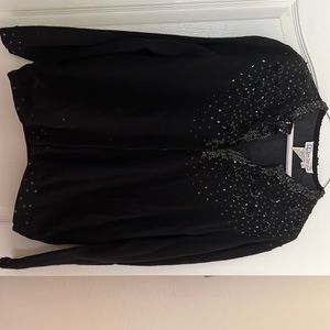Black sequined sweater, fully lined, button up.